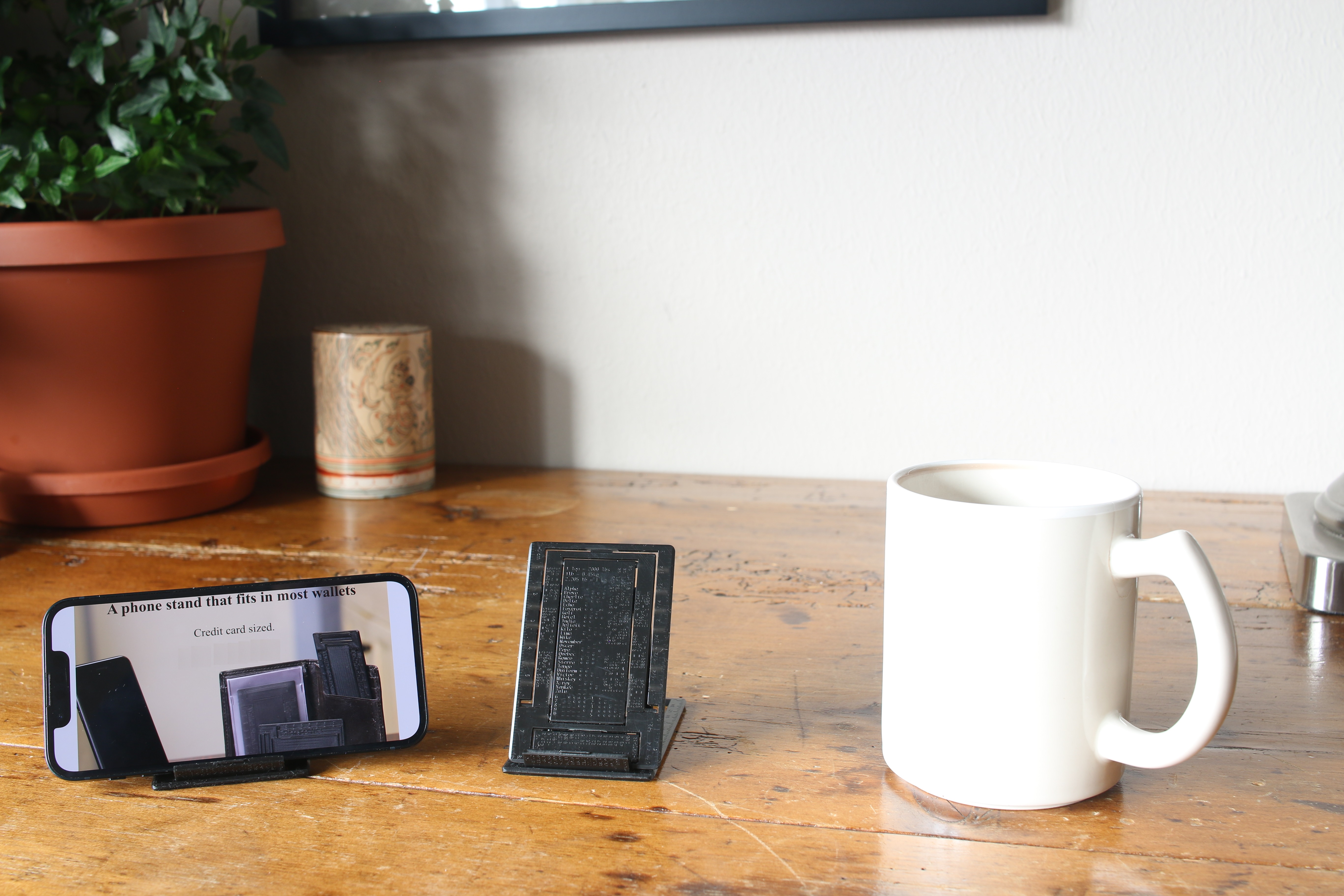 Wallet sized phone stand, WalletStand, in use.